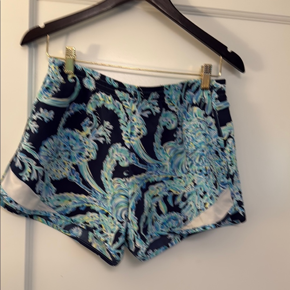 Blue and White Athletic Shorts with Vibrant Pattern
